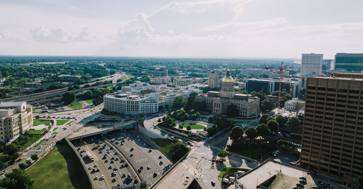 A stunning aerial shot of Atlanta, Georgia showcasing the Capitol Building and surrounding city skyline.