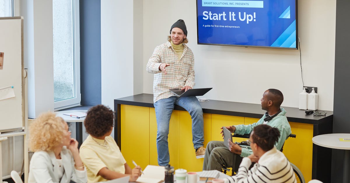 A diverse group in an office meeting discussing startup strategies and innovative ideas.