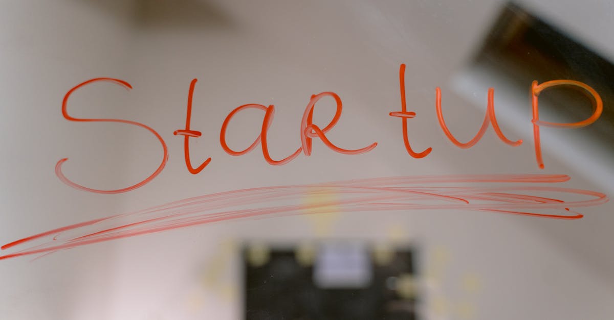 Conceptual image of startup text written on a mirror, symbolizing innovation and new beginnings.