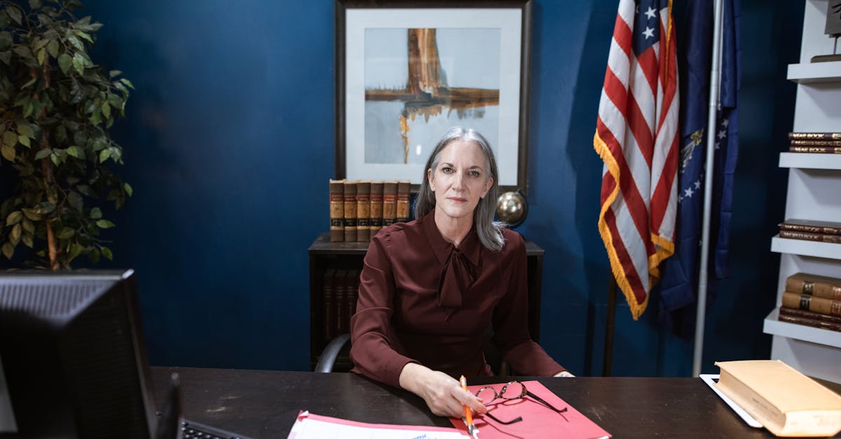 Professional woman in an office representing leadership and authority.