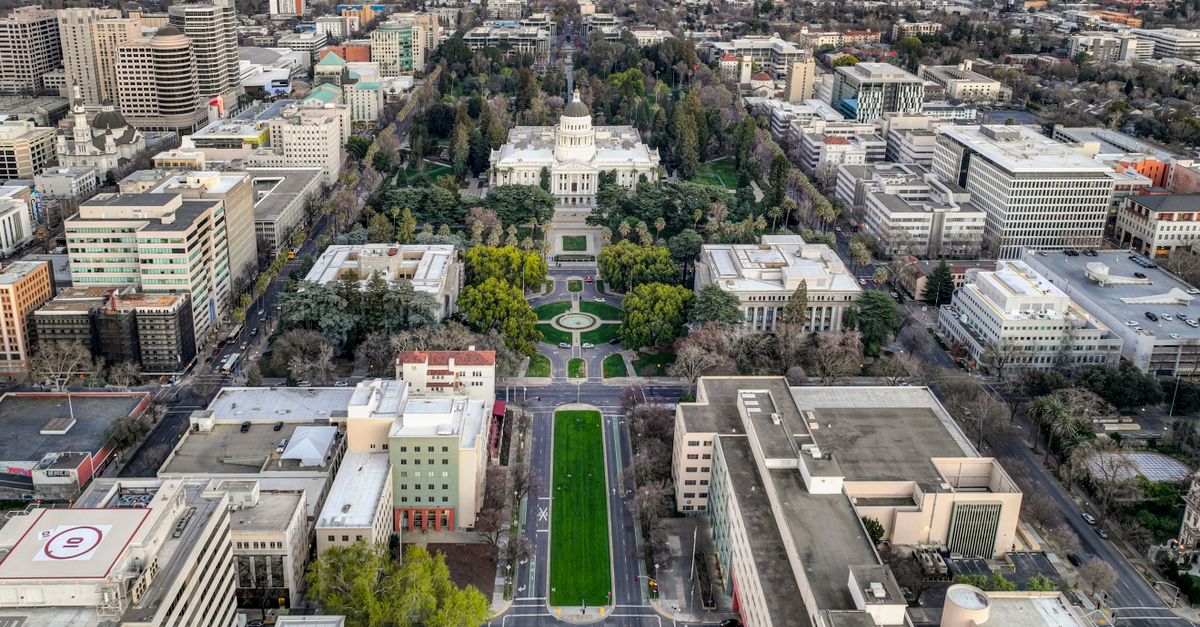Aerial view of downtown Sacramento showcasing the Capitol Building and surrounding cityscape.