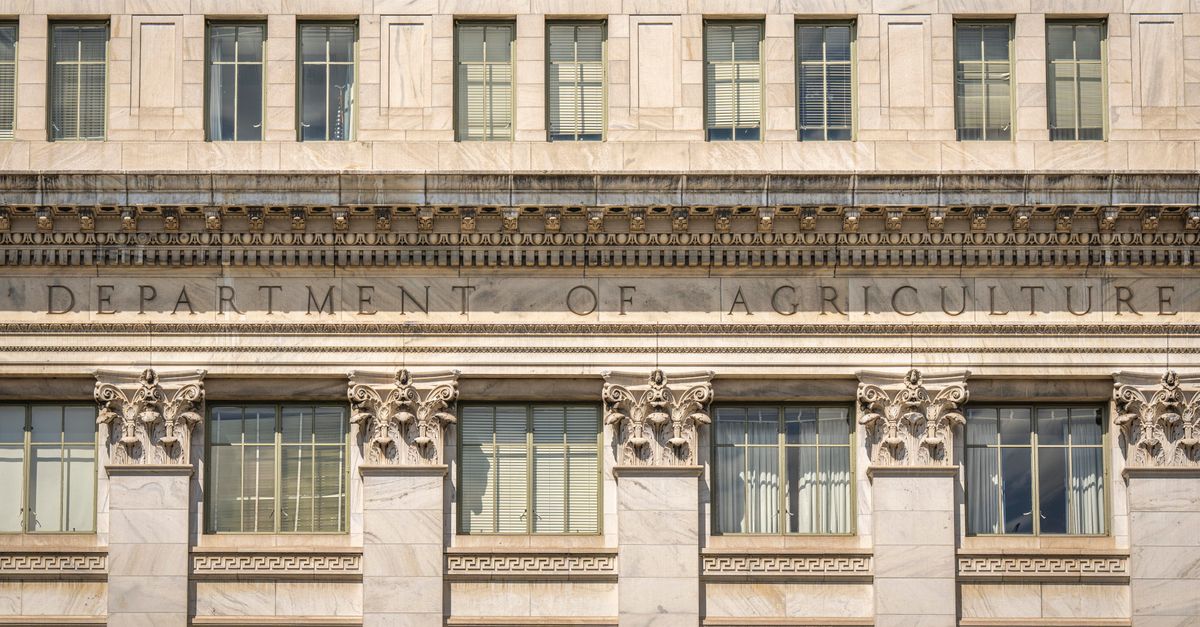 Close-up of the Department of Agriculture building's architectural facade, showcasing intricate columns and windows.
