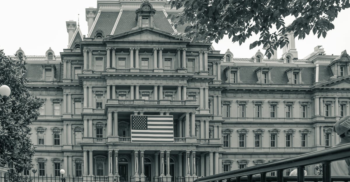 View of the Eisenhower Executive Office Building in Washington with American flag.