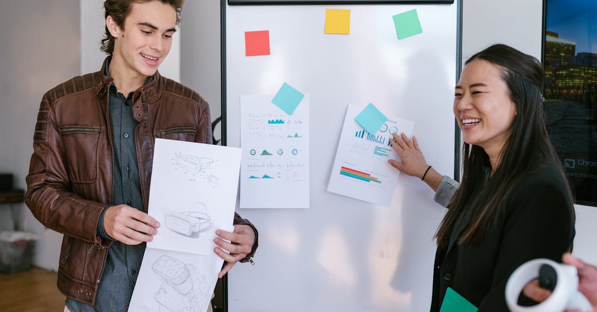 Young professionals collaborating on business ideas and presentation development.