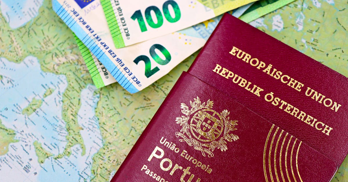 Portugal and Austria passports displayed with Euro currency notes on European map background.