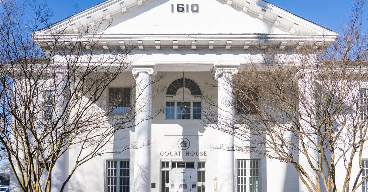 Front view of the historic Hampton Courthouse in Virginia, showcasing Neoclassical architecture.