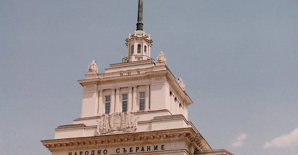 Low angle view of the Sofia Party House in Sofia, Bulgaria with a slight gray sky background.