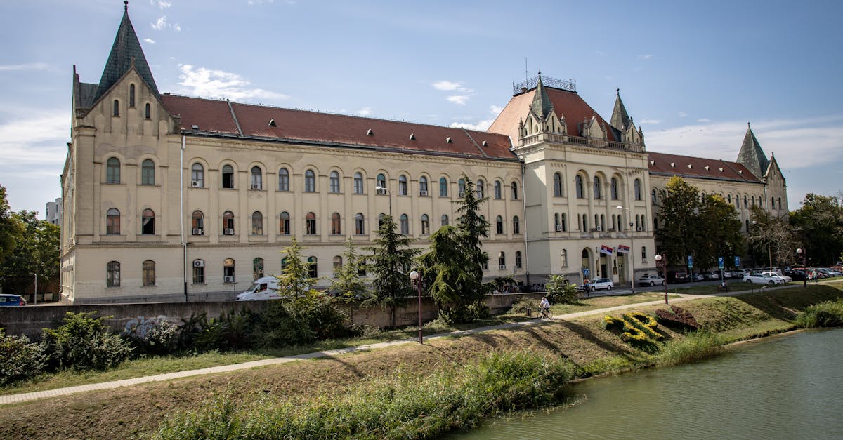 Beautiful view of the Zrenjanin Courthouse, a historic landmark by the river.