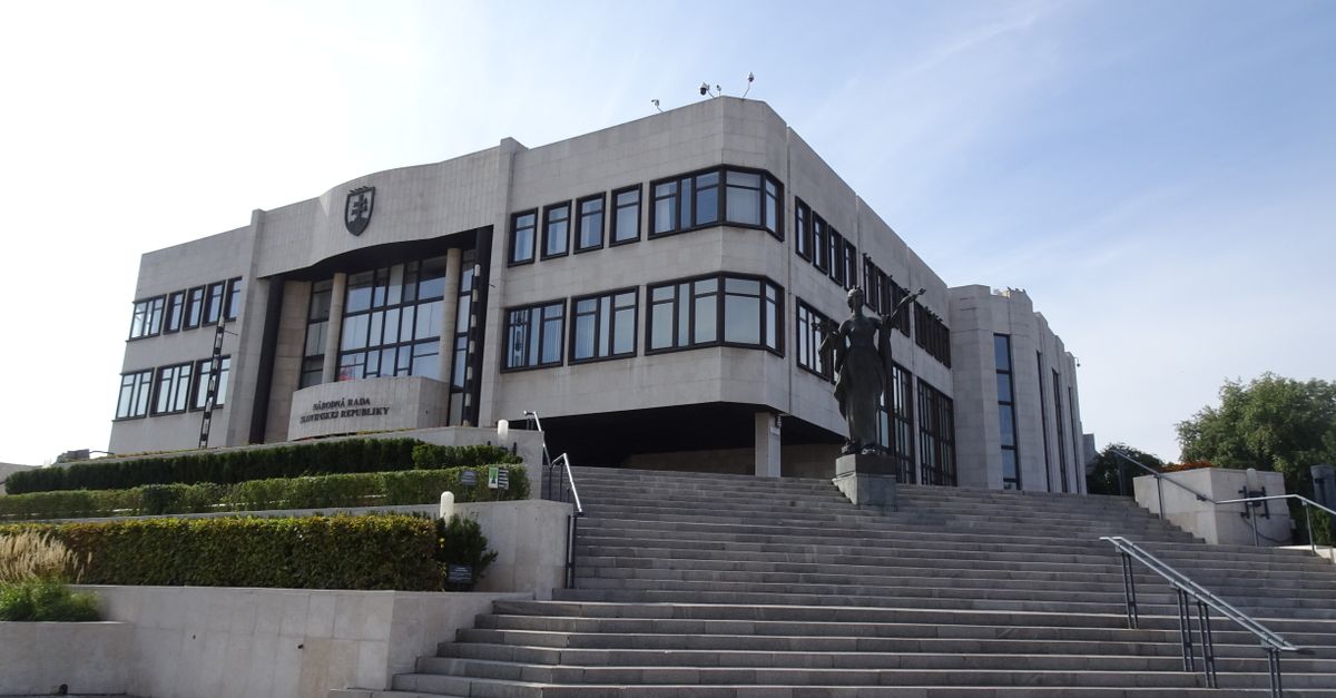 The modern Slovakian Parliament building in Bratislava, viewed from the front stairs on a sunny day.