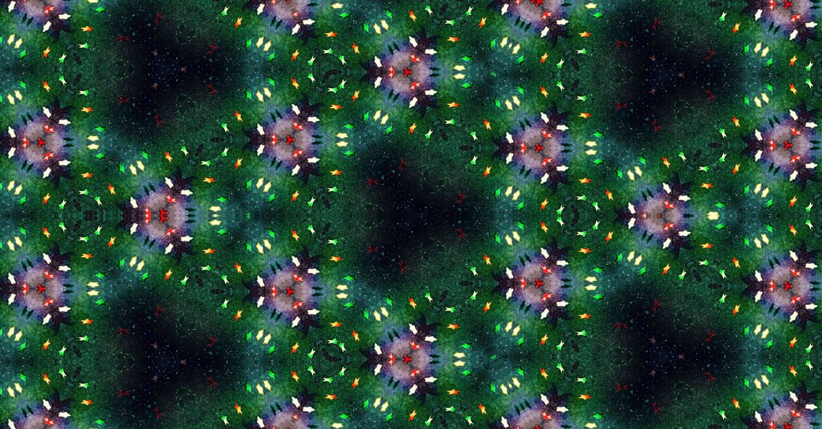 Colorful kaleidoscope pattern with ornate shapes and vibrant hues, ideal for background or design use.