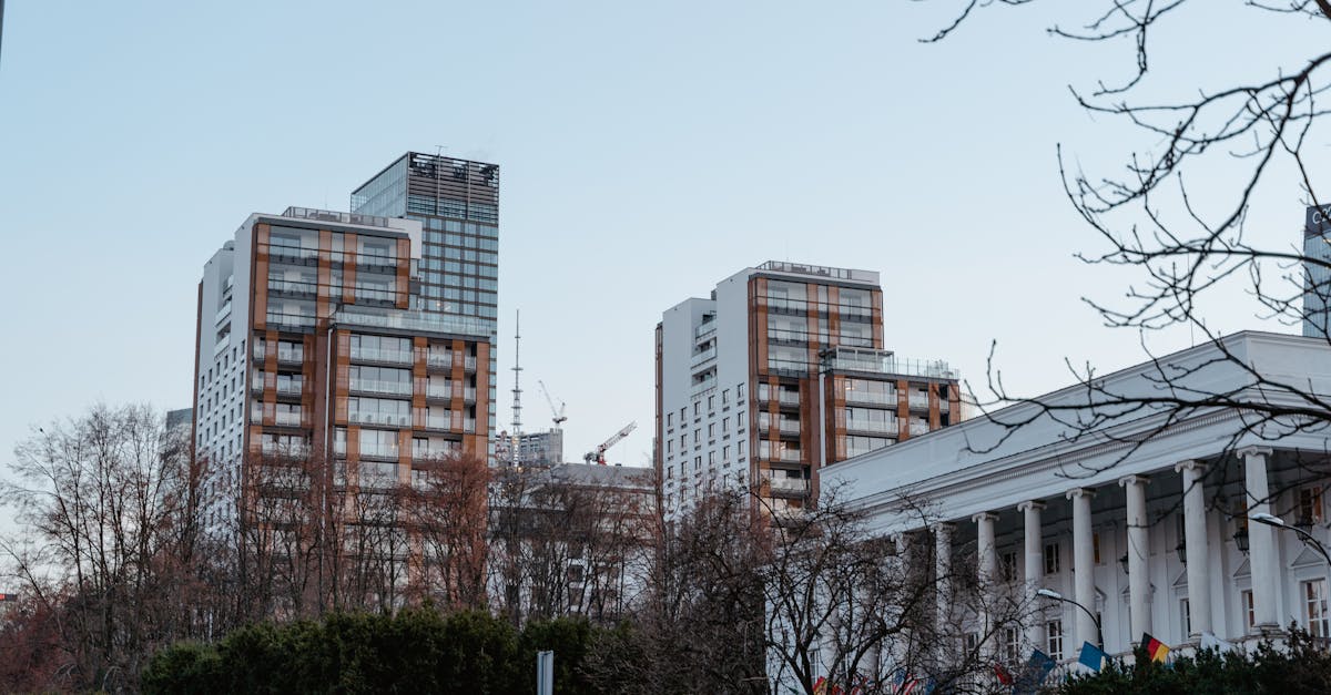 A view of contemporary high-rise buildings in an urban metropolis during the day.