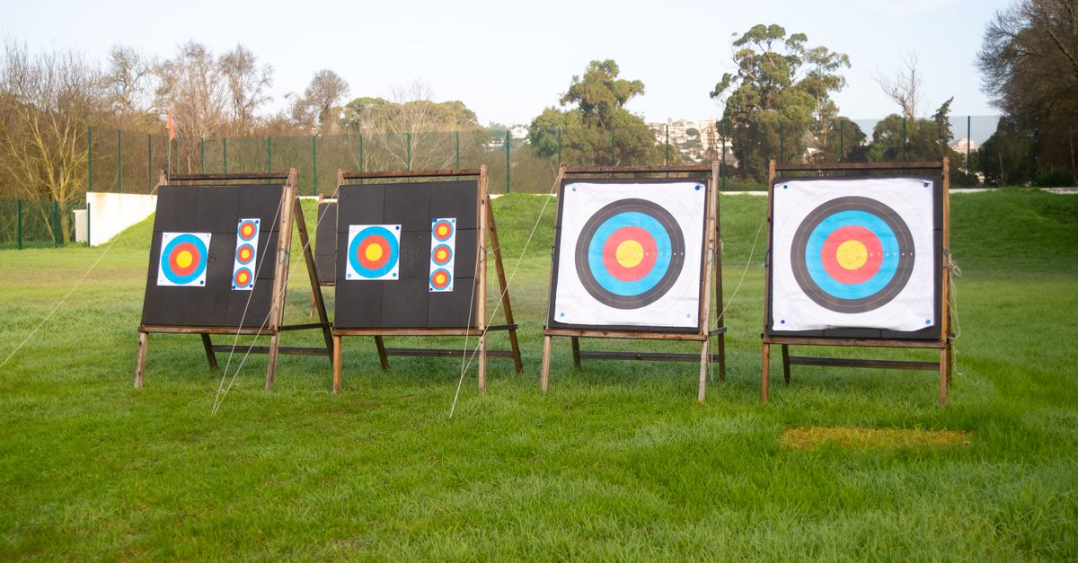 Outdoor archery targets on a grassy field in Portugal, ideal for sports practice.