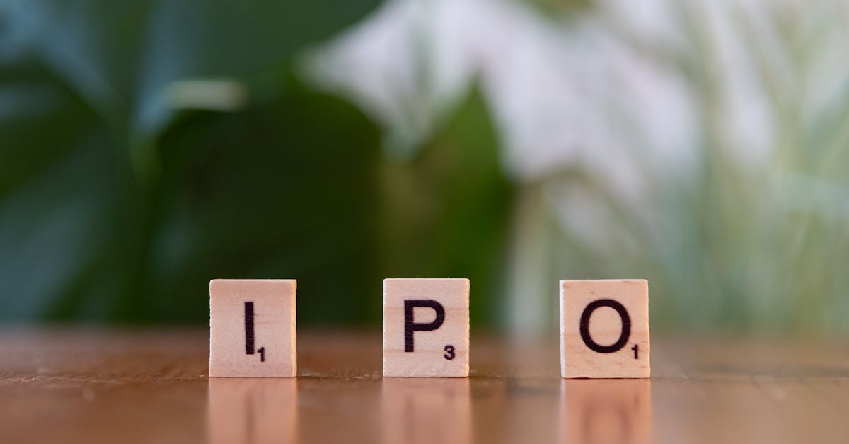 Wooden letter blocks spelling IPO on a table, symbolizing investment opportunities.
