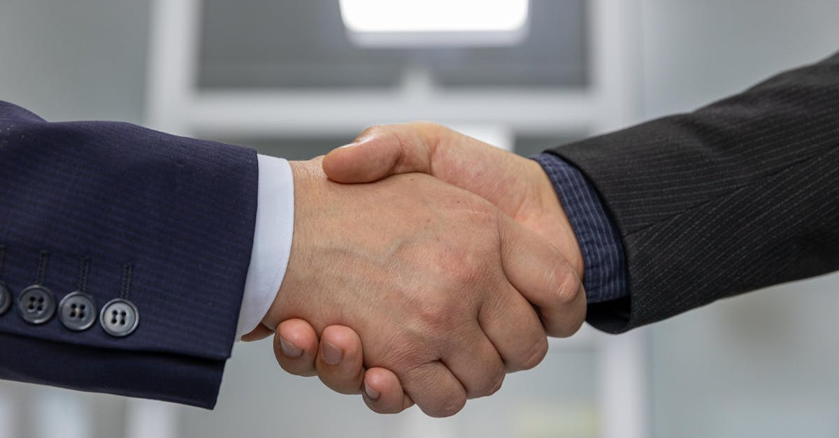 Close-up of a business handshake representing a successful partnership or agreement.