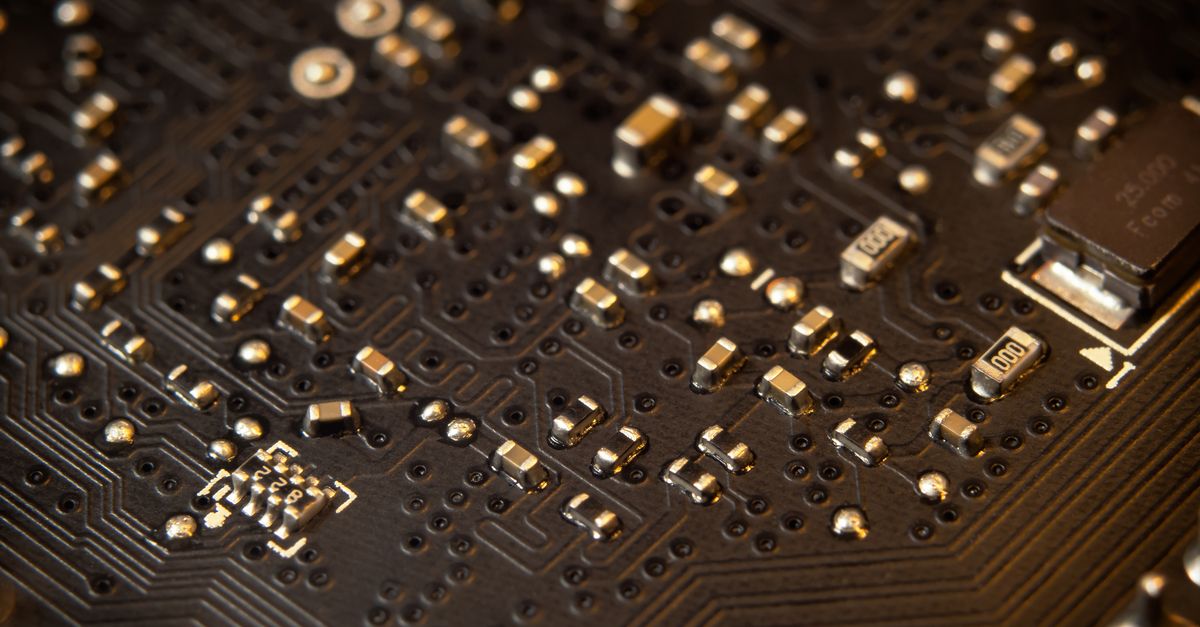 Detailed view of a circuit board showing various electronic components and traces.