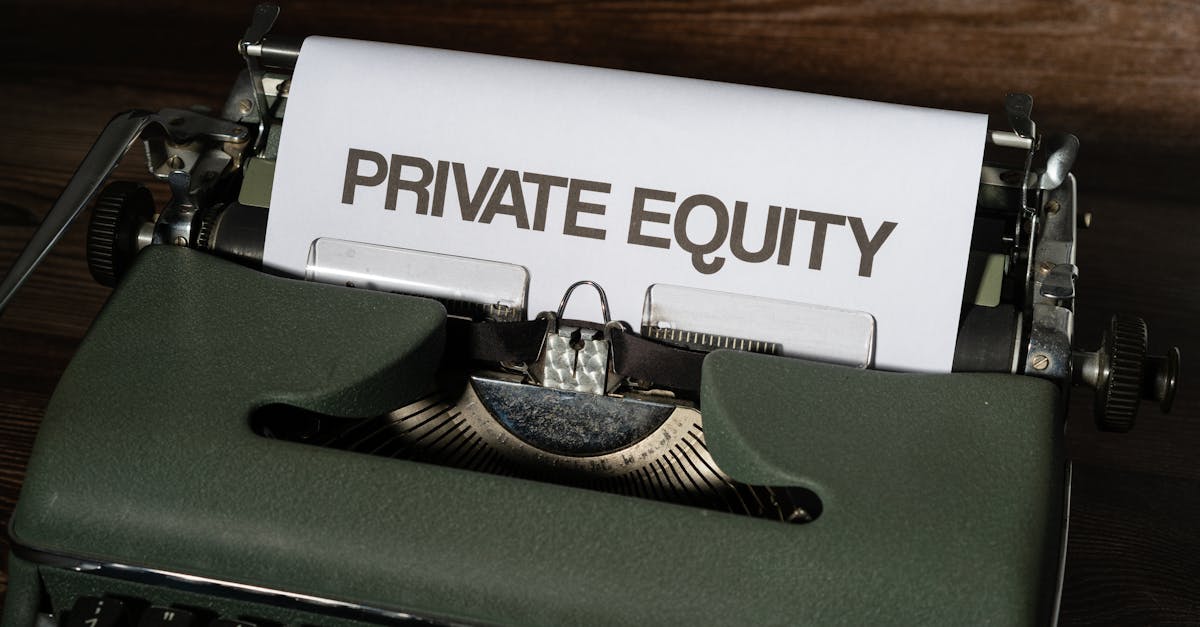Close-up of a vintage typewriter with paper displaying 'Private Equity'.