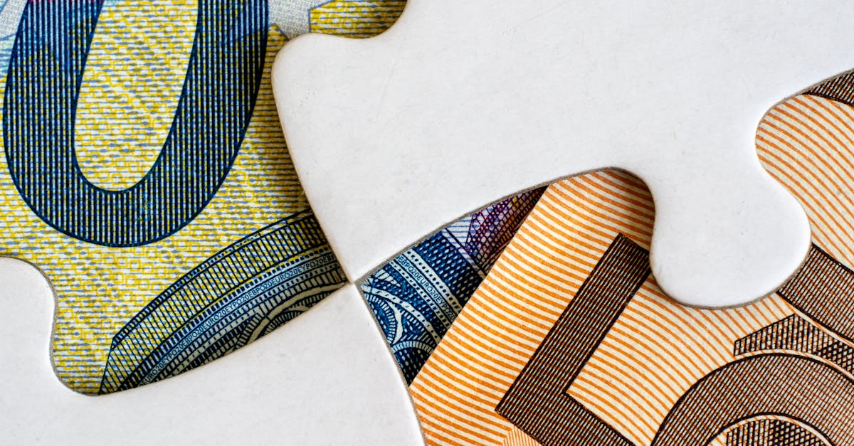 Close-up view of Euro currency notes represented as a jigsaw puzzle.