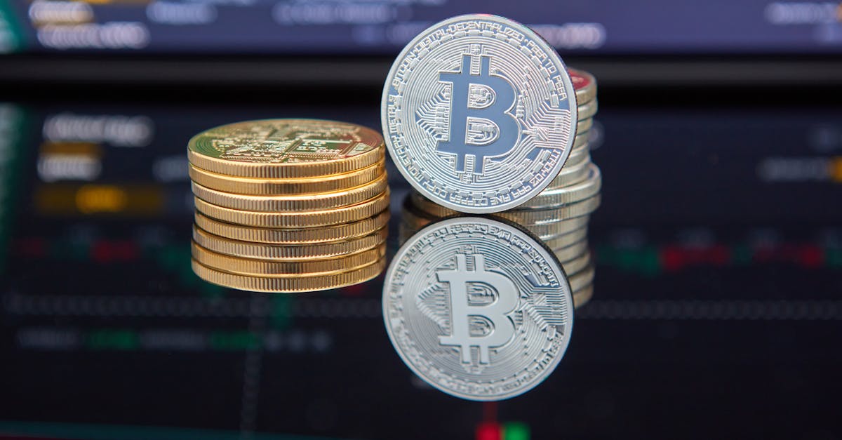 Bitcoin coins stacked in front of cryptocurrency trading chart reflecting market trends.
