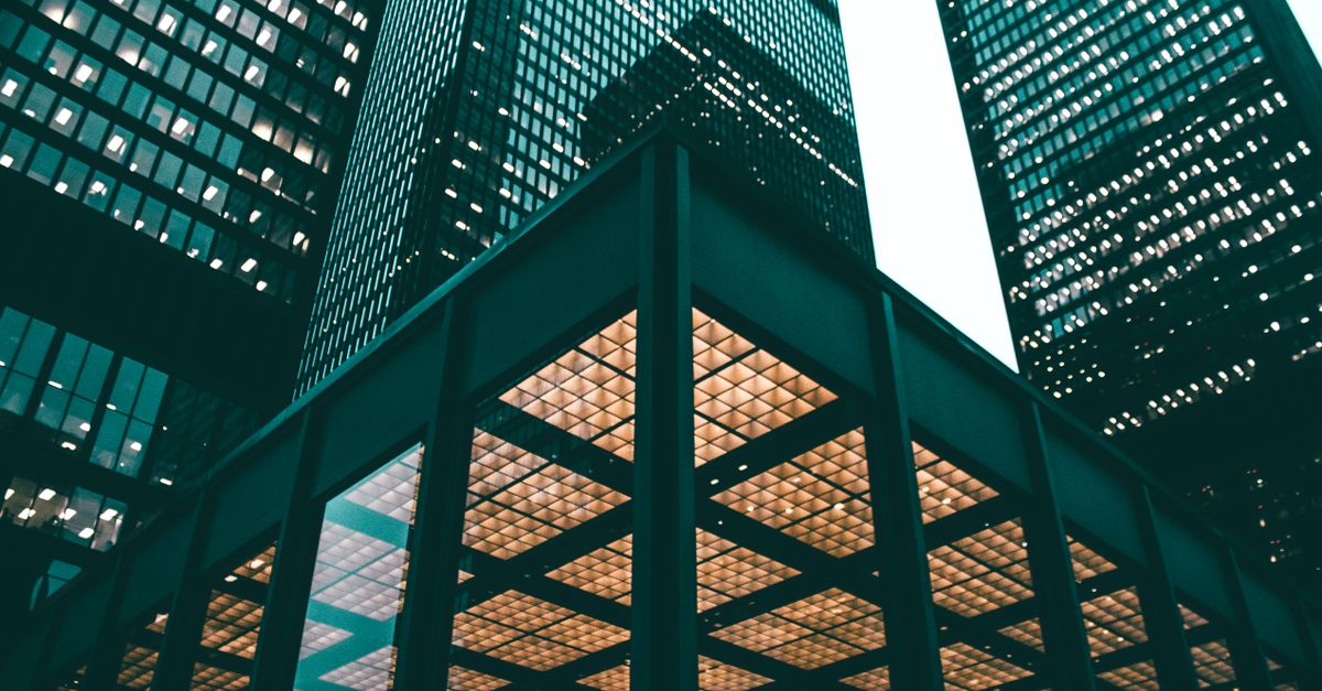 Low angle view of Toronto high-rises showcasing modern architectural design during daytime.