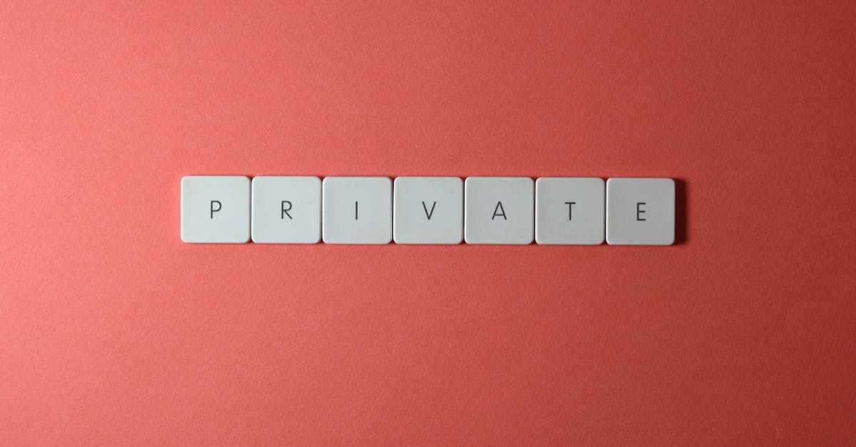 White letter tiles spelling 'PRIVATE' on a red background, offering conceptual minimalist design.