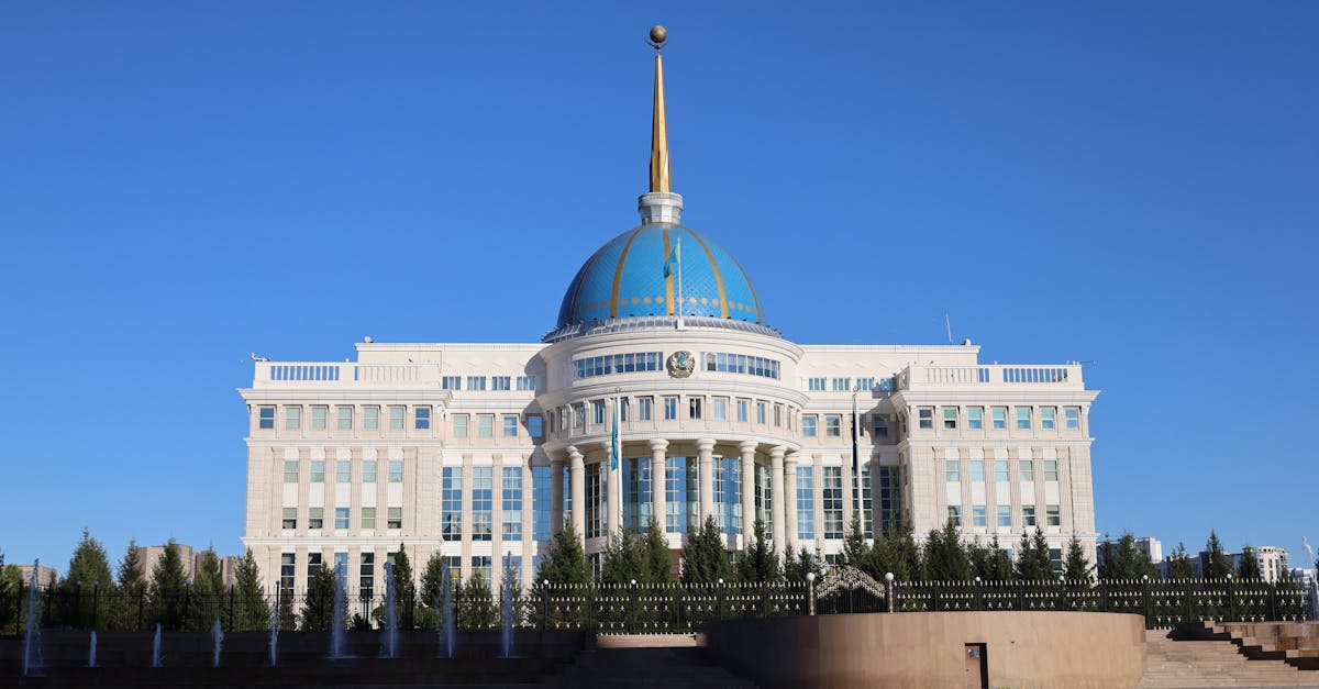 The Ak Orda Presidential Palace with its distinctive blue dome under a clear sky in Astana, Kazakhstan.