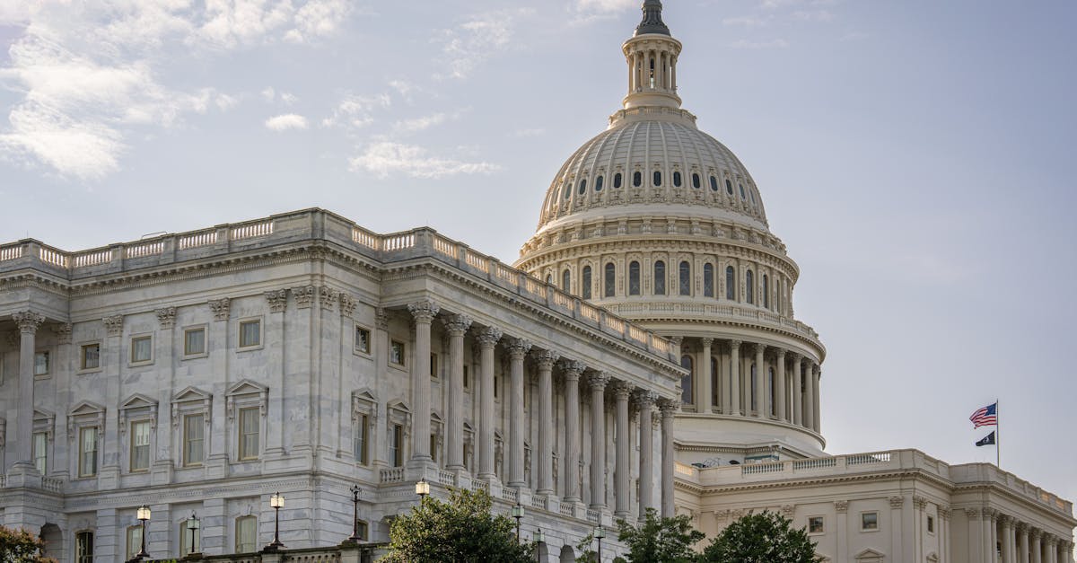 Stunning daytime view of the US Capitol Building in Washington DC, showcasing its architectural grandeur and iconic dome.