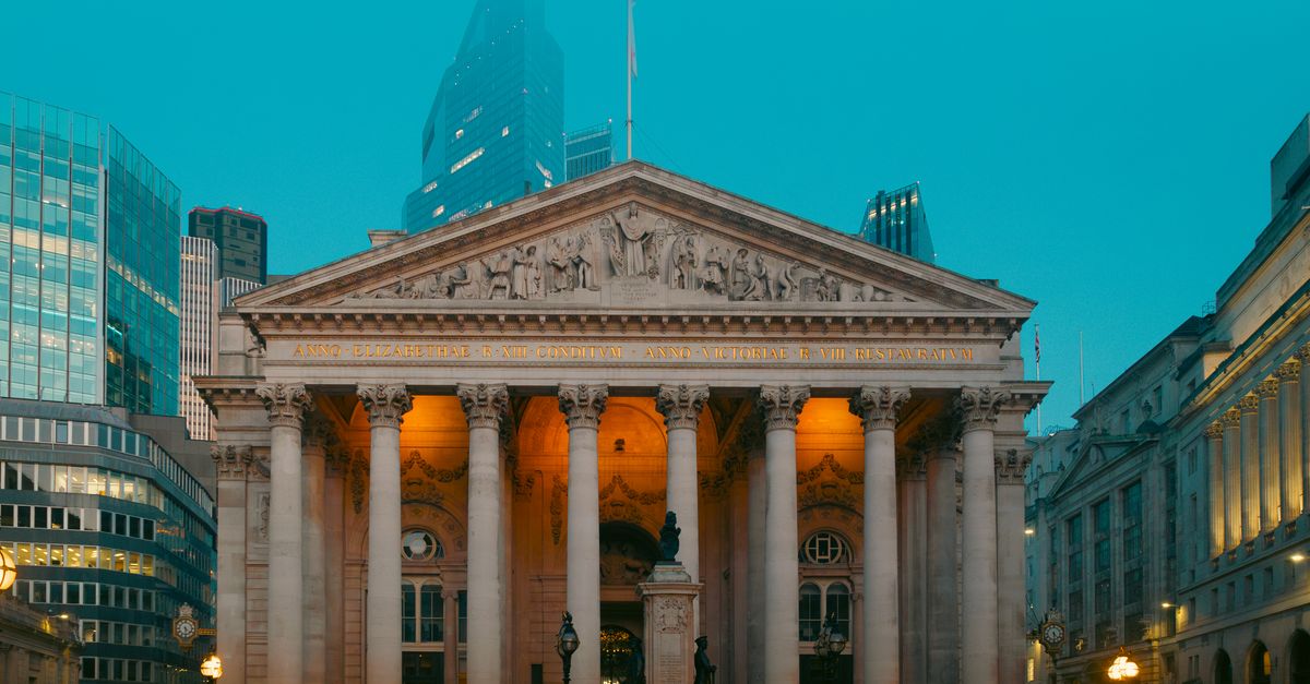 Stunning view of the Royal Exchange building in London during twilight.