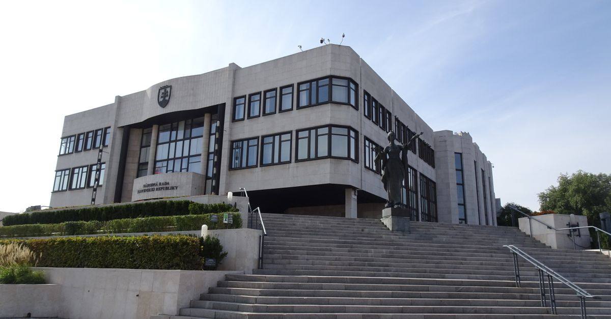 The modern Slovakian Parliament building in Bratislava, viewed from the front stairs on a sunny day.