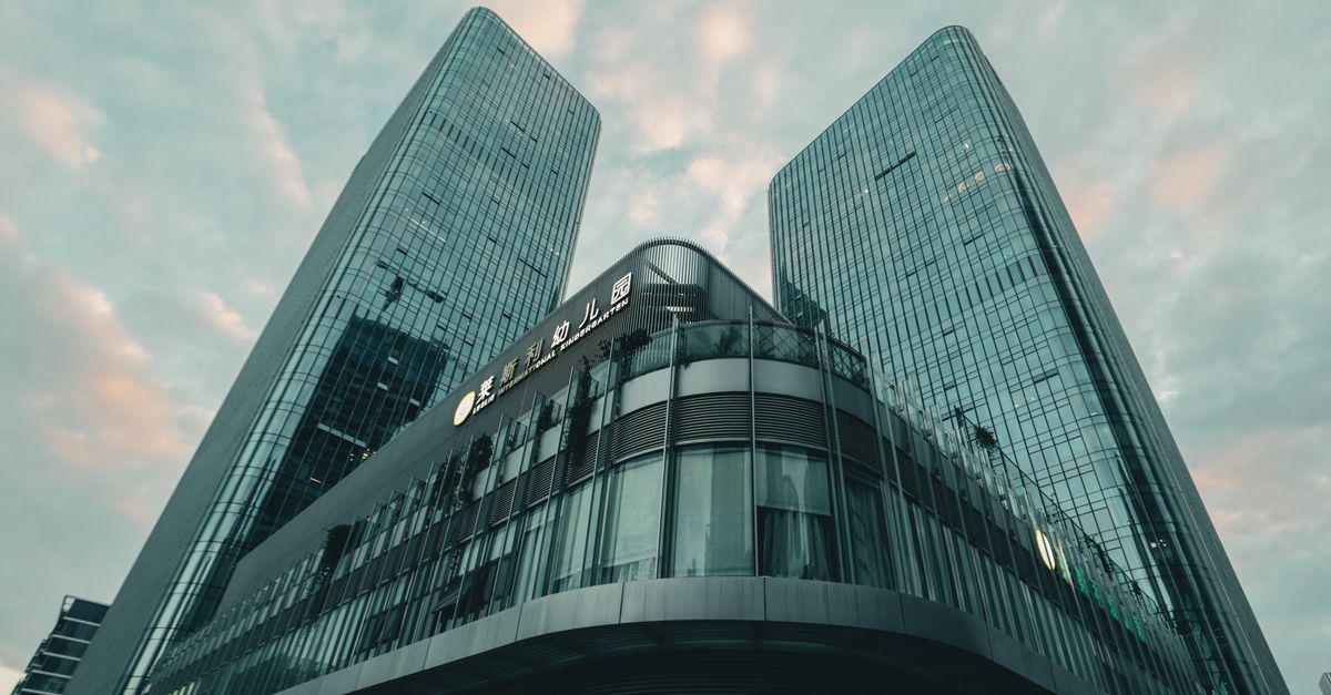 A striking view of modern skyscrapers in Shenzhen, China under a morning sky, showcasing stunning architecture.
