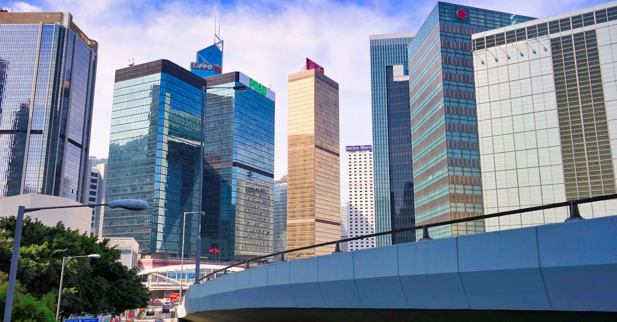 Stunning view of Hong Kong's vibrant skyscrapers and urban architecture under a blue sky.