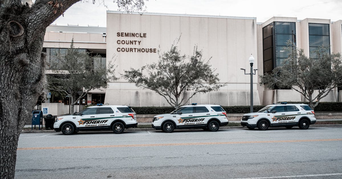 Sheriff vehicles parked outside the Seminole County Courthouse, capturing law enforcement presence.