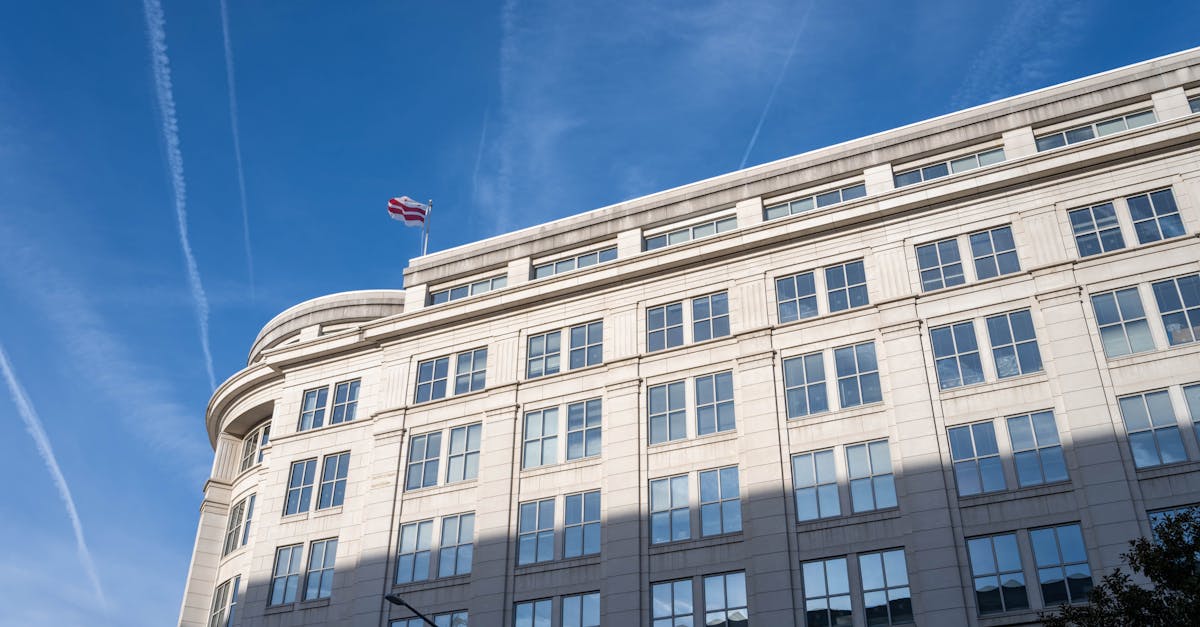Elegant office building under a clear blue sky in Washington, D.C.